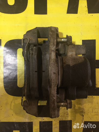 Суппорт передний правый Kia Shuma седан