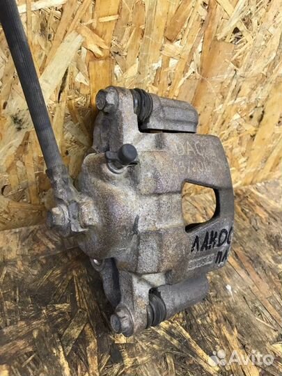 Суппорт тормозной передний левый Chevrolet Lanos