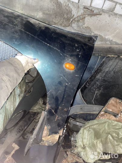 Крыло левое Hyundai Elantra J2