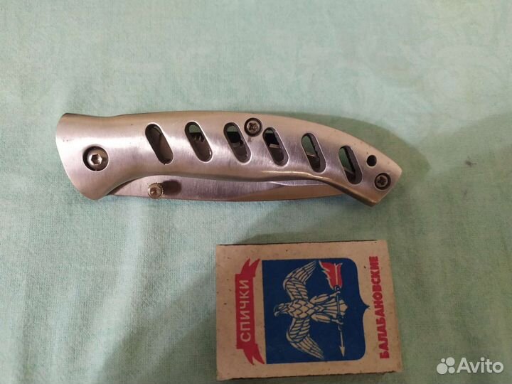 Нож складной полусеррейтор для рыболова