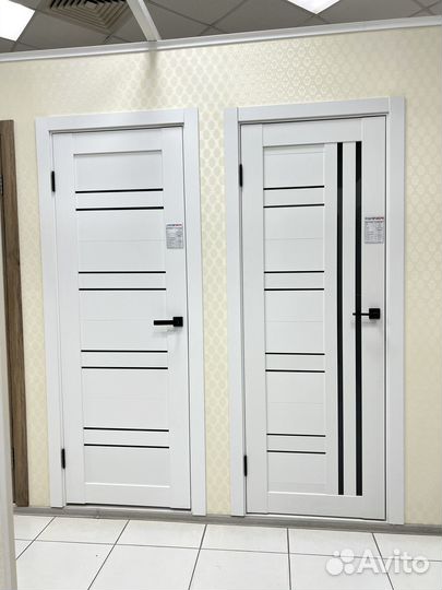 Белая межкомнатная дверь