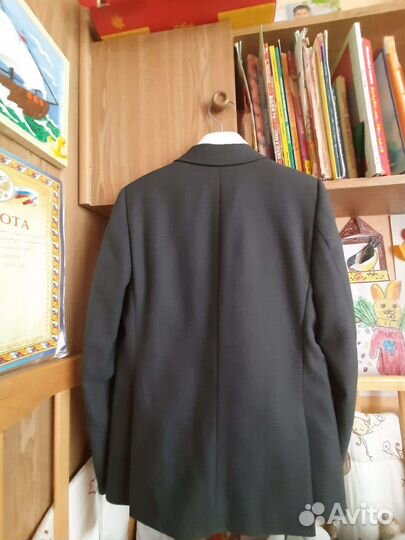 Новый школьный костюм для мальчика 134