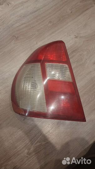 Фонарь задний рено симбол