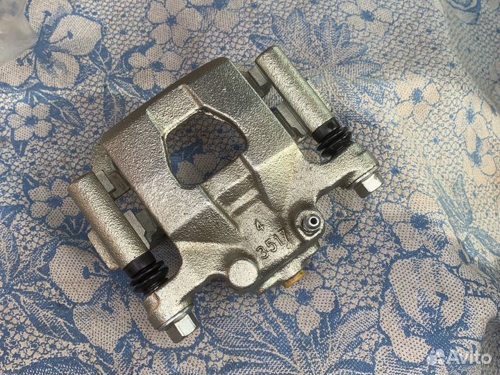 Суппорт тормозной задний левый