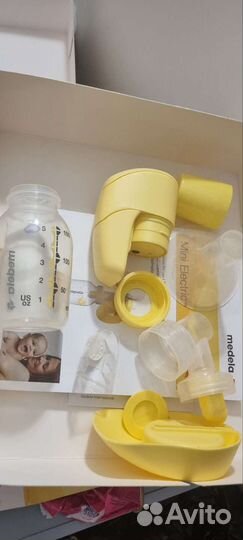 Молокоотсос medela электрический