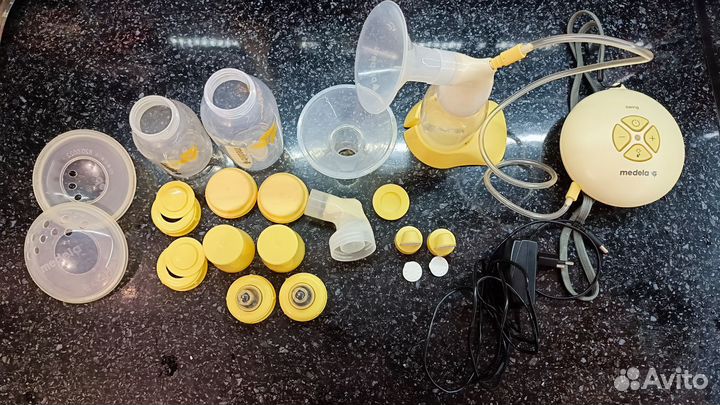 Молокоотсос medela swing электрический