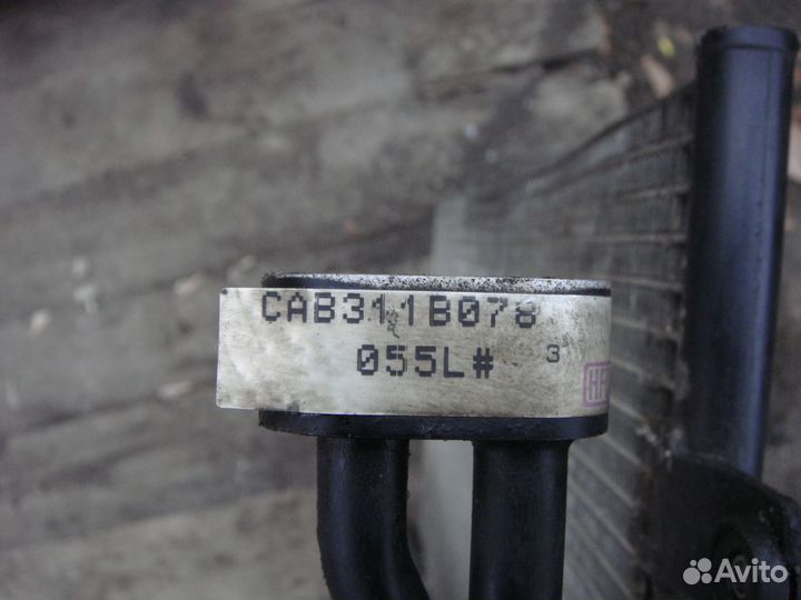 Радиатор кондиционера Mitsubishi Carisma