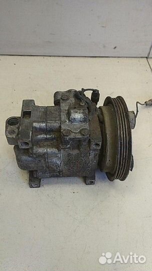 Компрессор кондиционера Mazda Familia