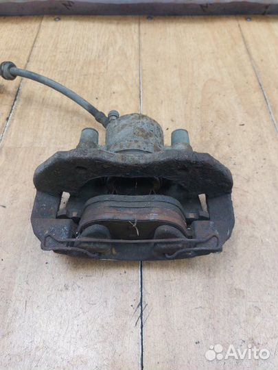 Тормозной суппорт передний левый Ford Focus 2 hwda