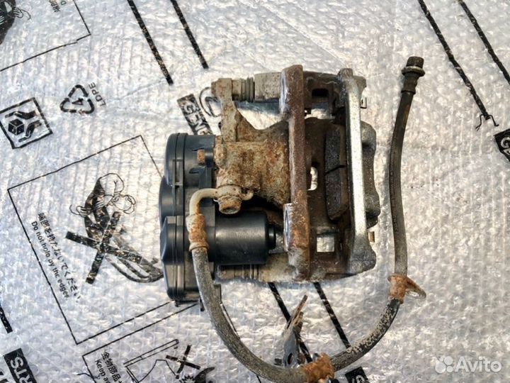 Суппорт тормозной задний левый Lexus Rx 4