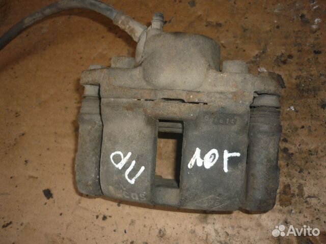 Суппорт передний правый Рено Логан