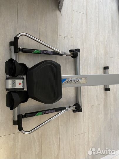 Гребной тренажер