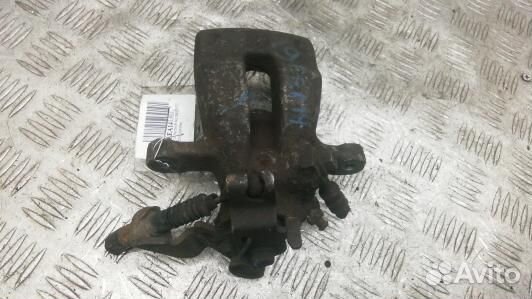 Суппорт тормозной задний левый opel astra H (EEA14