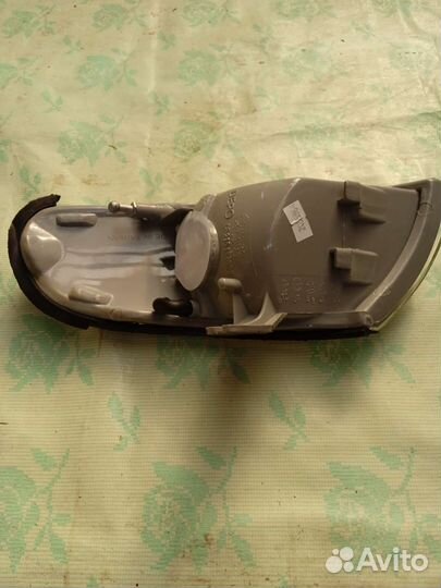 Левый поворотник Мазда 626