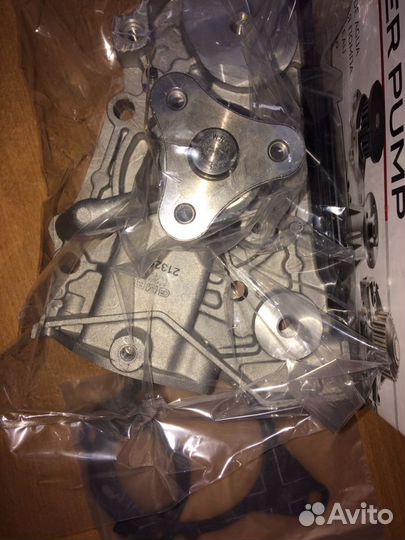 Помпа водяная Киа Спектра / Рио 1