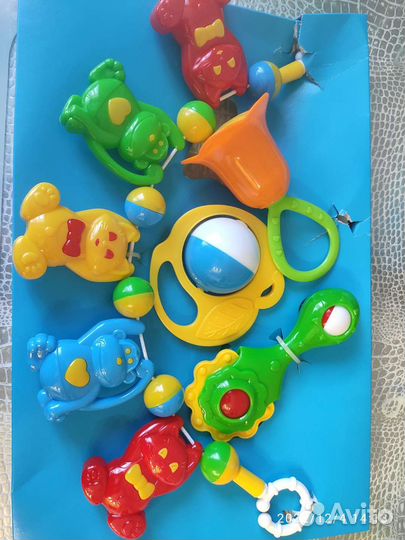 Игрушки погремушки для малышей