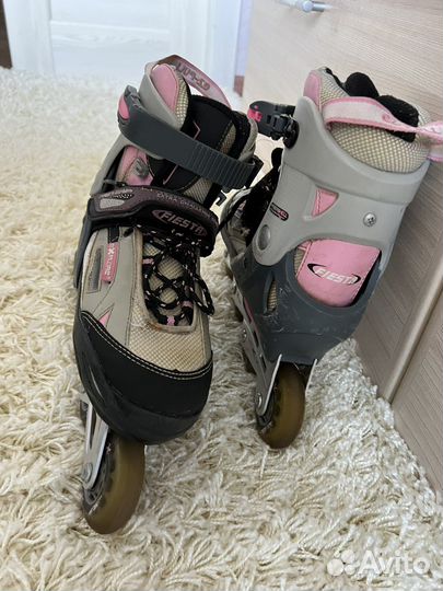 Роликовые коньки