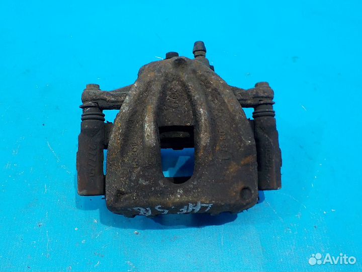 Тормозной суппорт передний левый toyota Avensis (T