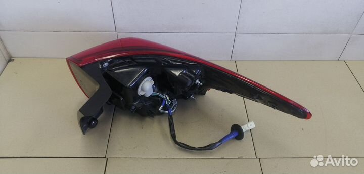 Фонарь задний наружный левый Outlander (GF) 2012