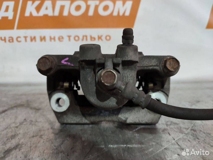 Суппорт зад. лев. Mazda CX-7 2009