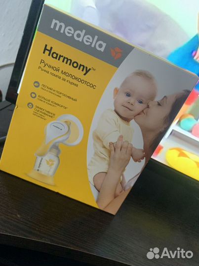 Молокоотсос medela с доп. воронкой(торг)