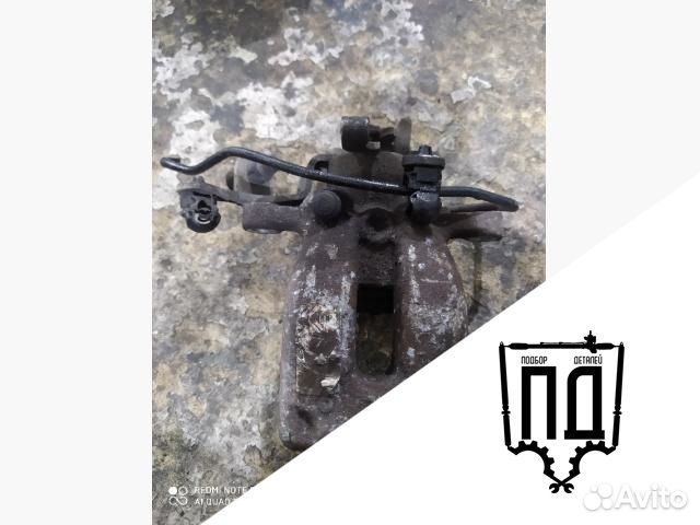 Суппорт задний левый