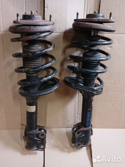 Передние стойки Mitsubishi Outlander 1