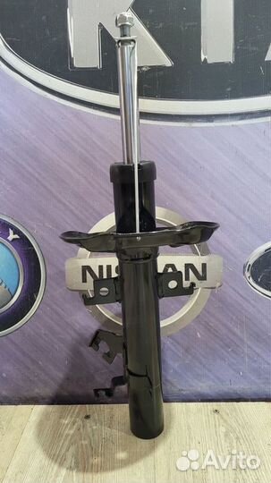 Амортизатор стойка перед Nissan X-trail T32 Лев