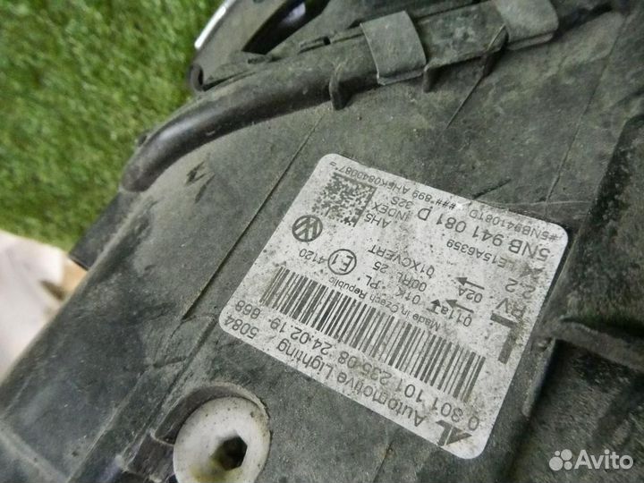 Фара левая Volkswagen Tiguan