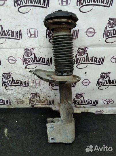 Амортизатор передний левый Peugeot 308