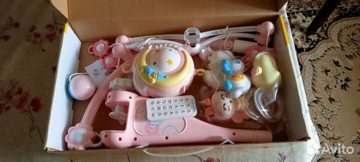 Музыкальная игрушка на кроватку