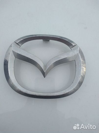 Эмблема Мазда