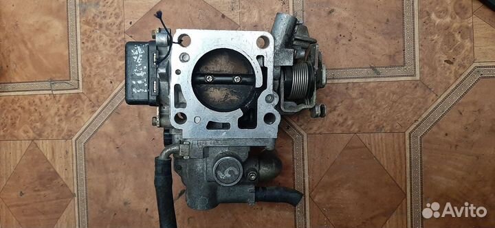 Дроссельная заслонка Mazda 323 1799500161