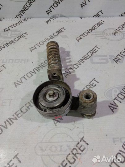 Натяжитель ремня Opel Astra J