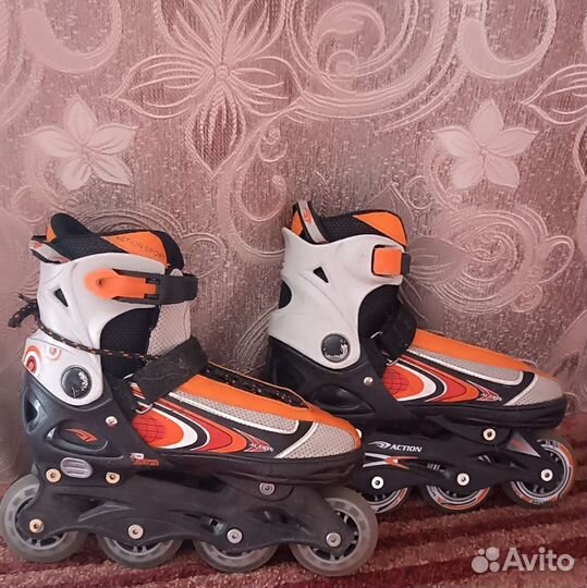 Роликовые коньки