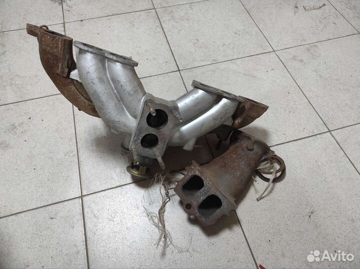 Коллектор выпускной 402 двигателя,новый