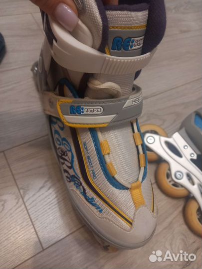 Роликовые коньки