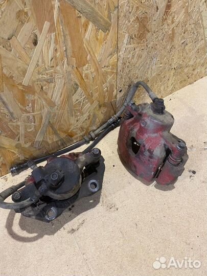 Суппорт тормозной передний Volkswagen Polo cедан