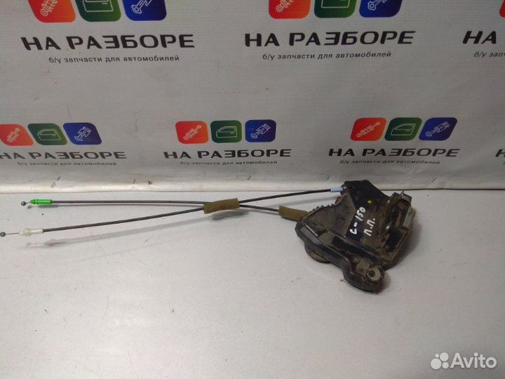 Замок двери передний правый Toyota Corolla E150