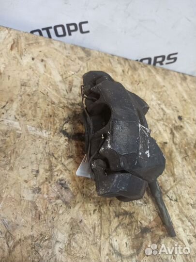 Суппорт тормозной передний левый Peugeot/Citroen