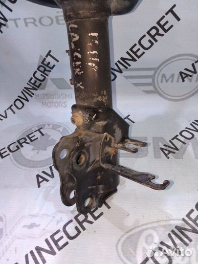 Стойка амортизатор Mitsubishi Lancer 10