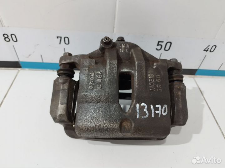 Суппорт тормозной передний правый ix35/Tucson 210