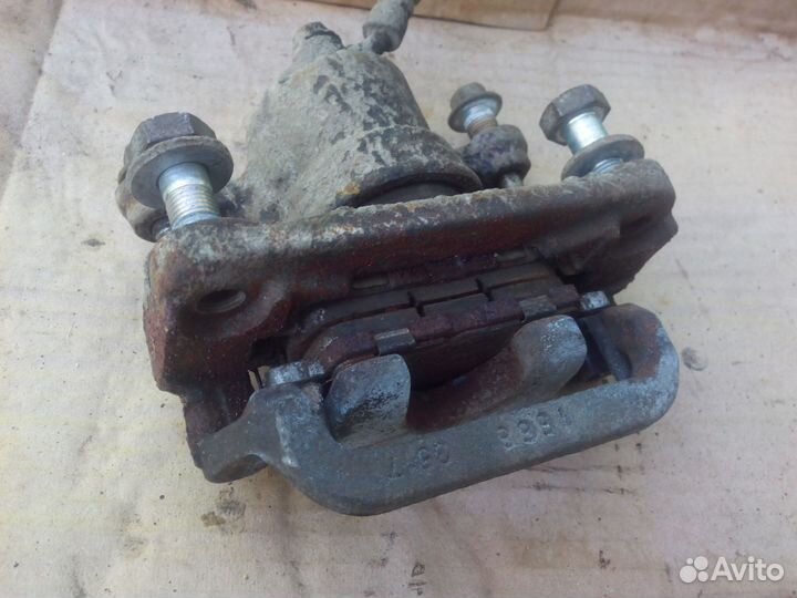 Суппорт тормозной Ниссан Теана 32