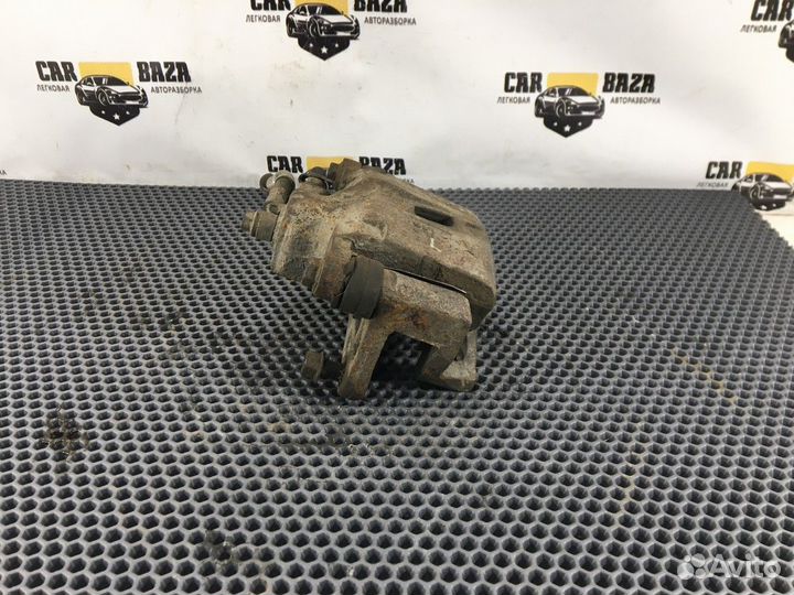 Суппорт задний левый L Kia Sorento