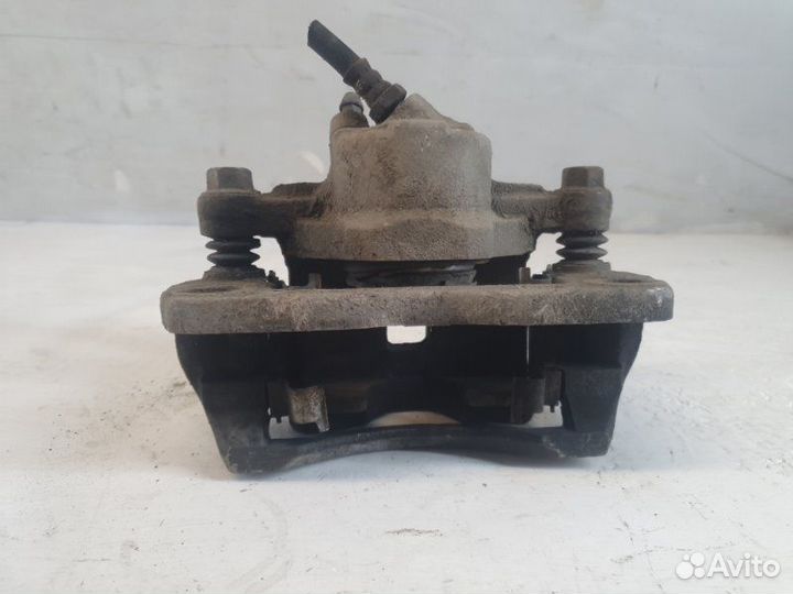 Суппорт передний левый Kia Spectra седан S6D 2007