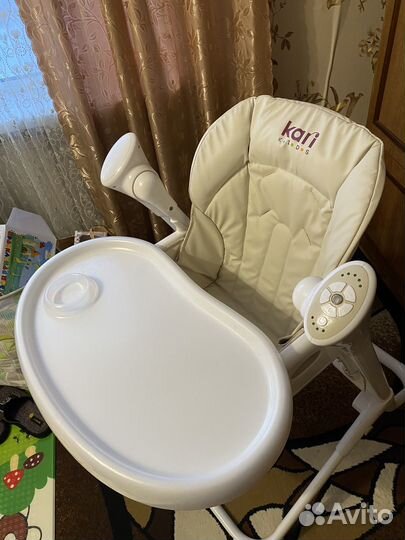 Стульчик для кормления с качелями