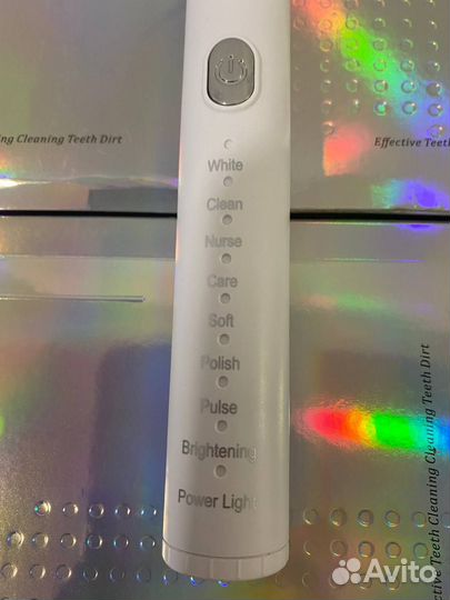 Электрическая звуковая зубная щетка