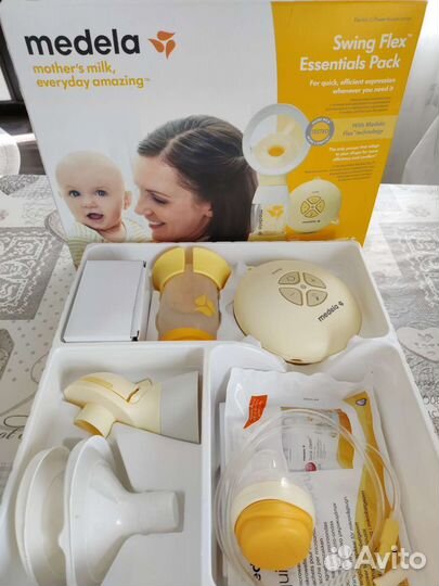 Молокоотсос medela электрический