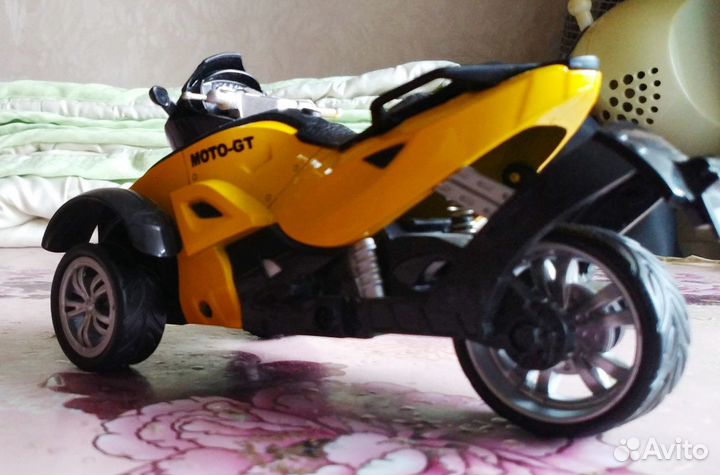Игрушка трицикл