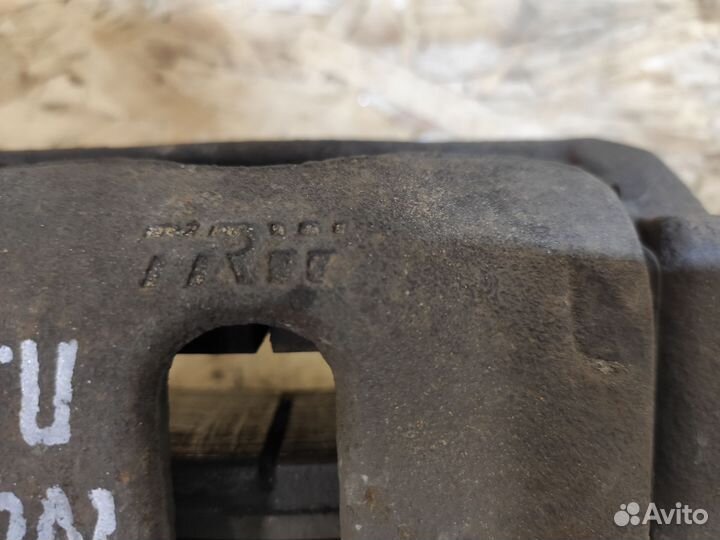 Суппорт передний левый Nissan Note